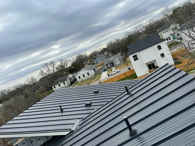 Standing seam metal roof panels with vents for Skylight Repair in Gaithersburg